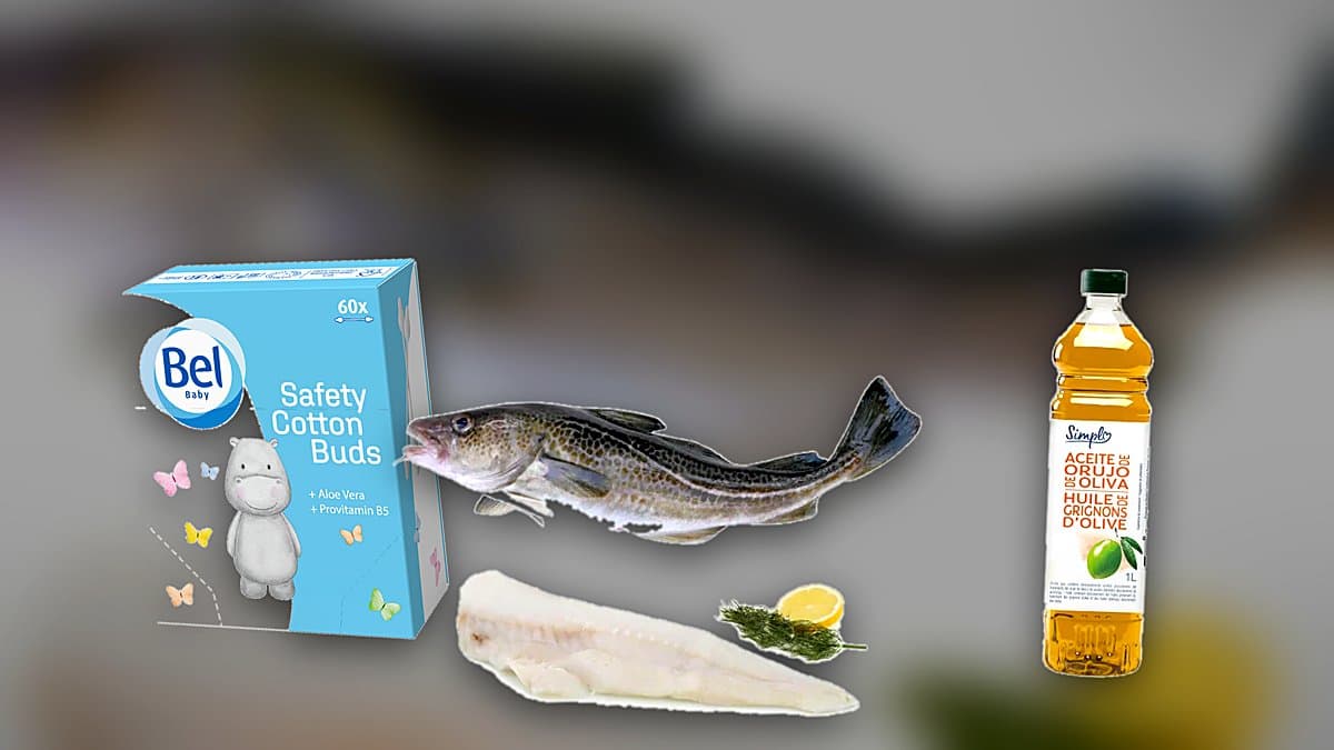Tarrina de bacalao en aceite en la estantería refrigerada de un supermercado, etiqueta de lote visible