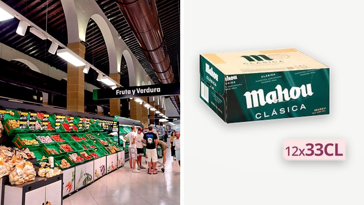Pack de doce latas de cerveza Mahou clásica con condensación en el lineal de un supermercado, etiqueta de precio visible al fondo