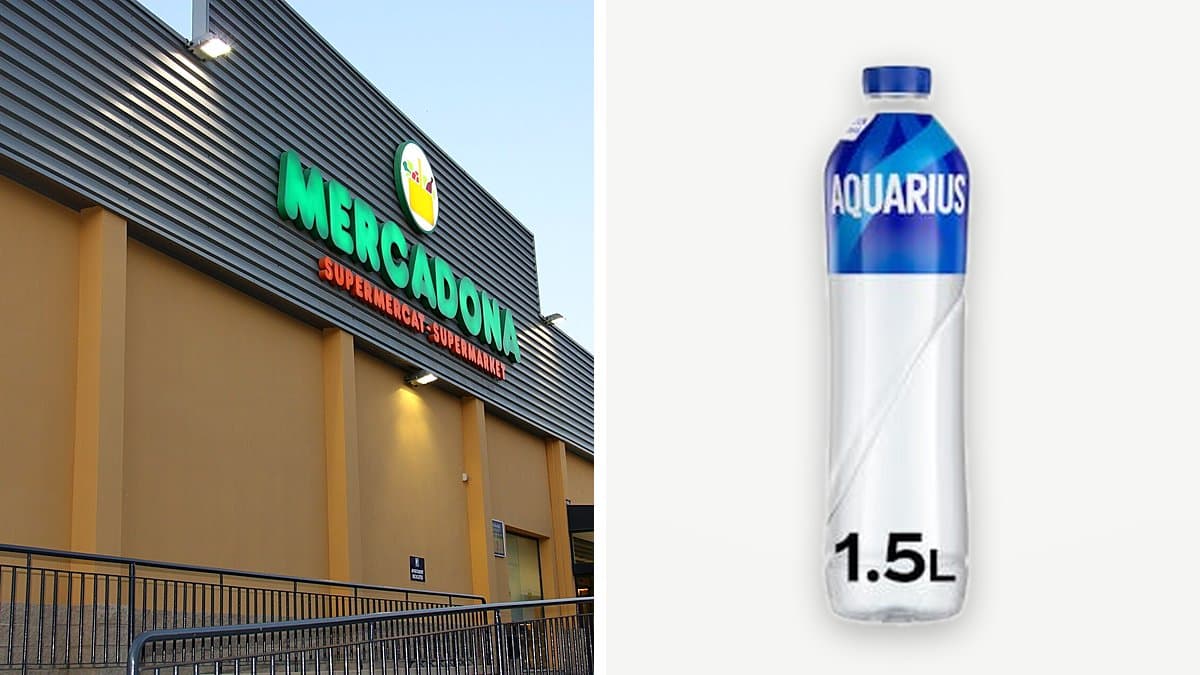 Botella de 1,5 litros de Aquarius de limón con hielo en vaso, luz de verano en cocina