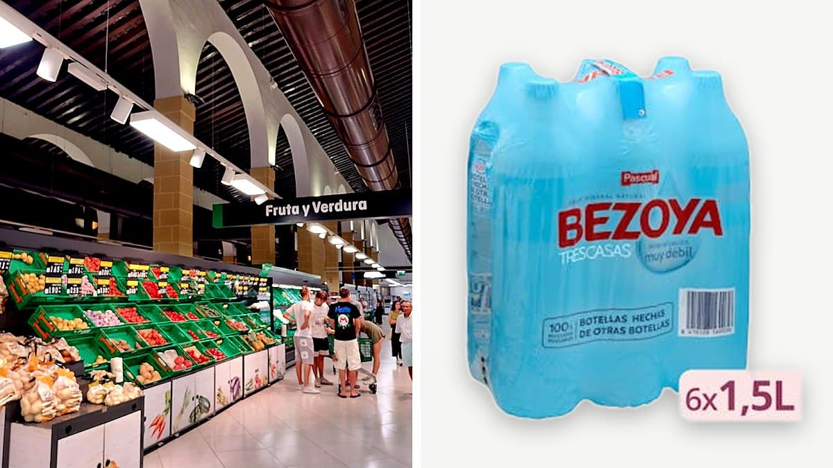 Garrafa de agua mineral Bezoya de 9 litros sobre suelo de cocina junto a botellas apiladas, mano agarrando el asa, luz natural suave