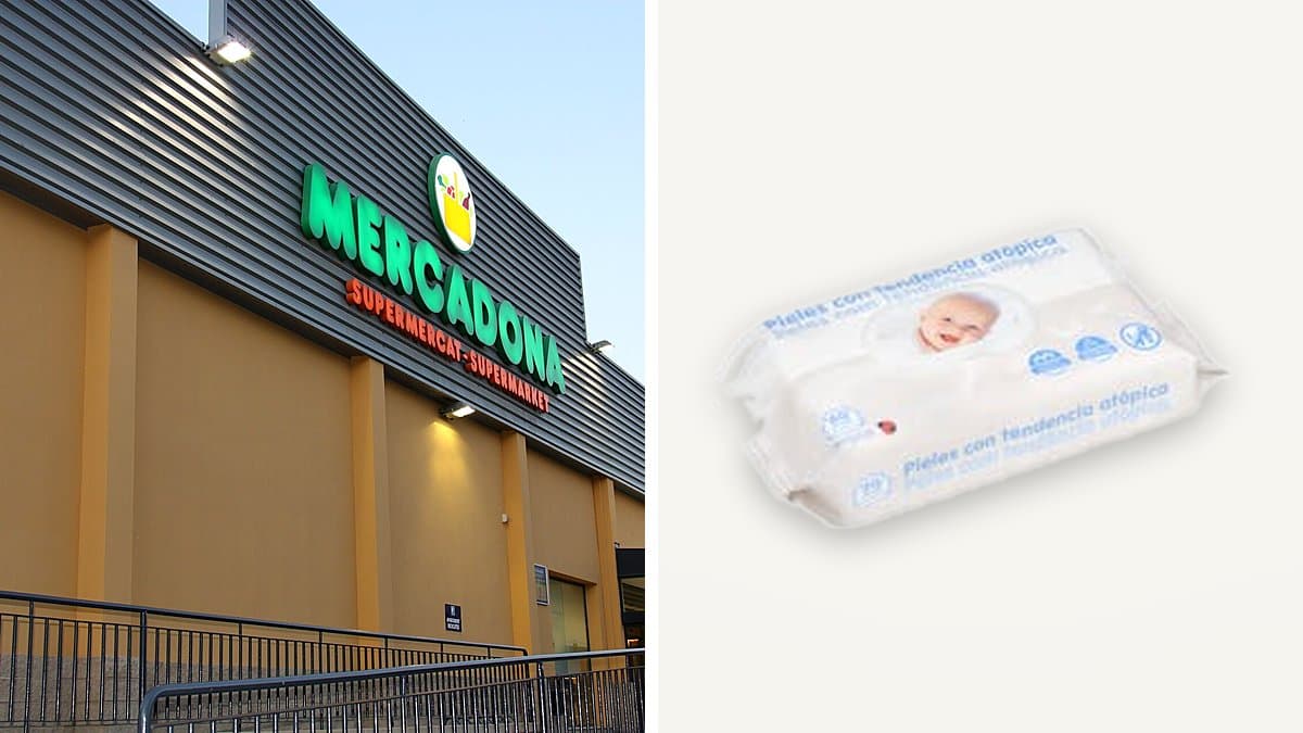 Empleado de Mercadona reponiendo productos en estantería de supermercado, clientes difuminados al fondo, iluminación cenital de retail