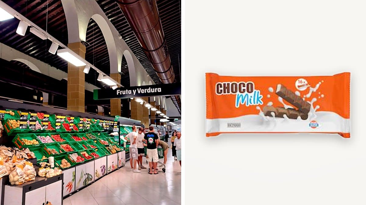 Pack de barritas de chocolate con leche Hacendado al lado de una mochila escolar y un vaso de leche en una mesa de cocina con luz otoñal
