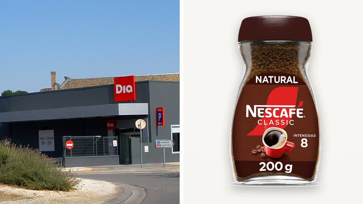 Bote de Nescafé soluble de 200 gramos junto a una taza de café con vapor en una cocina española con luz natural de mañana