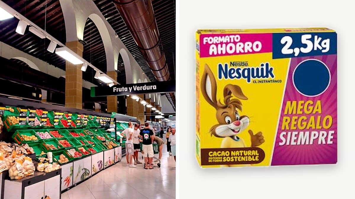 Lata grande de cacao soluble Nesquik sobre una mesa de desayuno junto a una taza de leche caliente