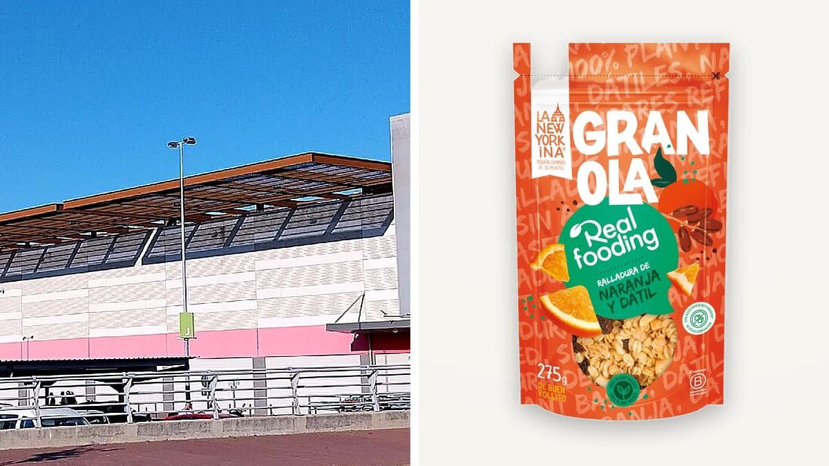 Granola crujiente con almendras y frutas secas en un bol de cerámica con yogur, escena de desayuno otoñal junto a una ventana
