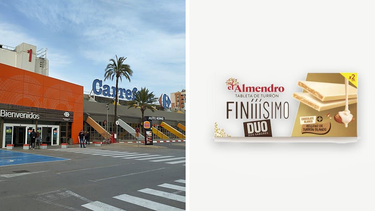 Tableta de turrón praliné dúo de chocolate blanco El Almendro de 170 gramos sobre superficie de madera con luces navideñas bokeh de fondo