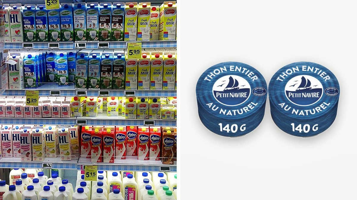 Comprador español leyendo atentamente el precio en la estantería del supermercado, expresión concentrada