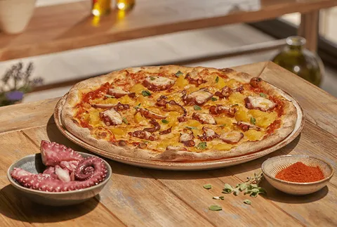 PULPO Á FEIRA FINA — Ginos