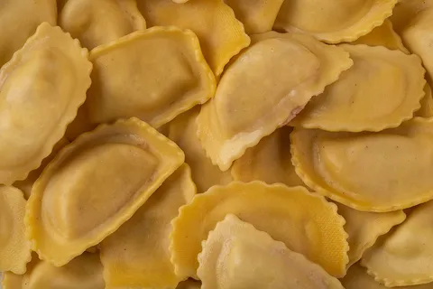 Mezzaluna (De rulo de cabra y bacon) — La Tagliatella