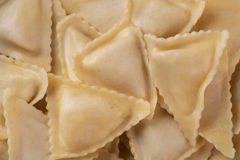 Triangoli (De Gorgonzola DOP y pera) — La Tagliatella