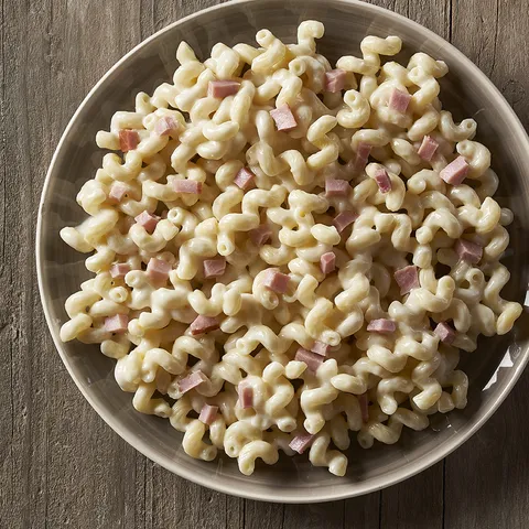 Riccioli con formaggio e prosciutto cotto — Muerde la Pasta
