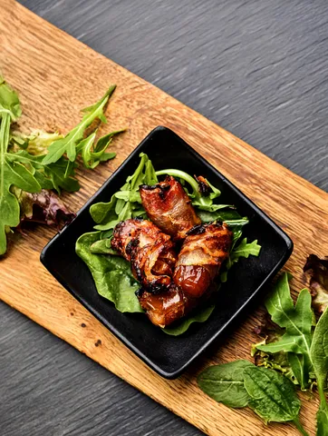 Bacon wrapped dates — Pincho Nation